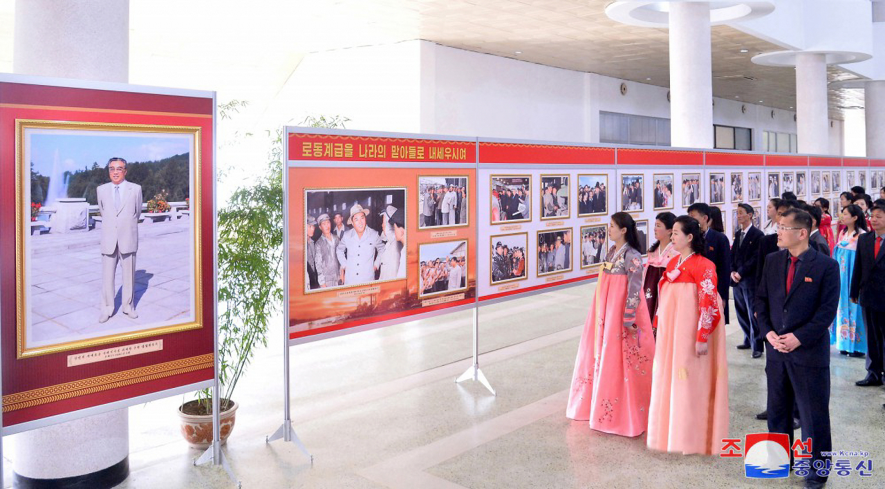 This photo carried on Tuesday shows the North holding a photo exhibition marking the 112th birthday of late founder Kim Il-sung. (KCNA)