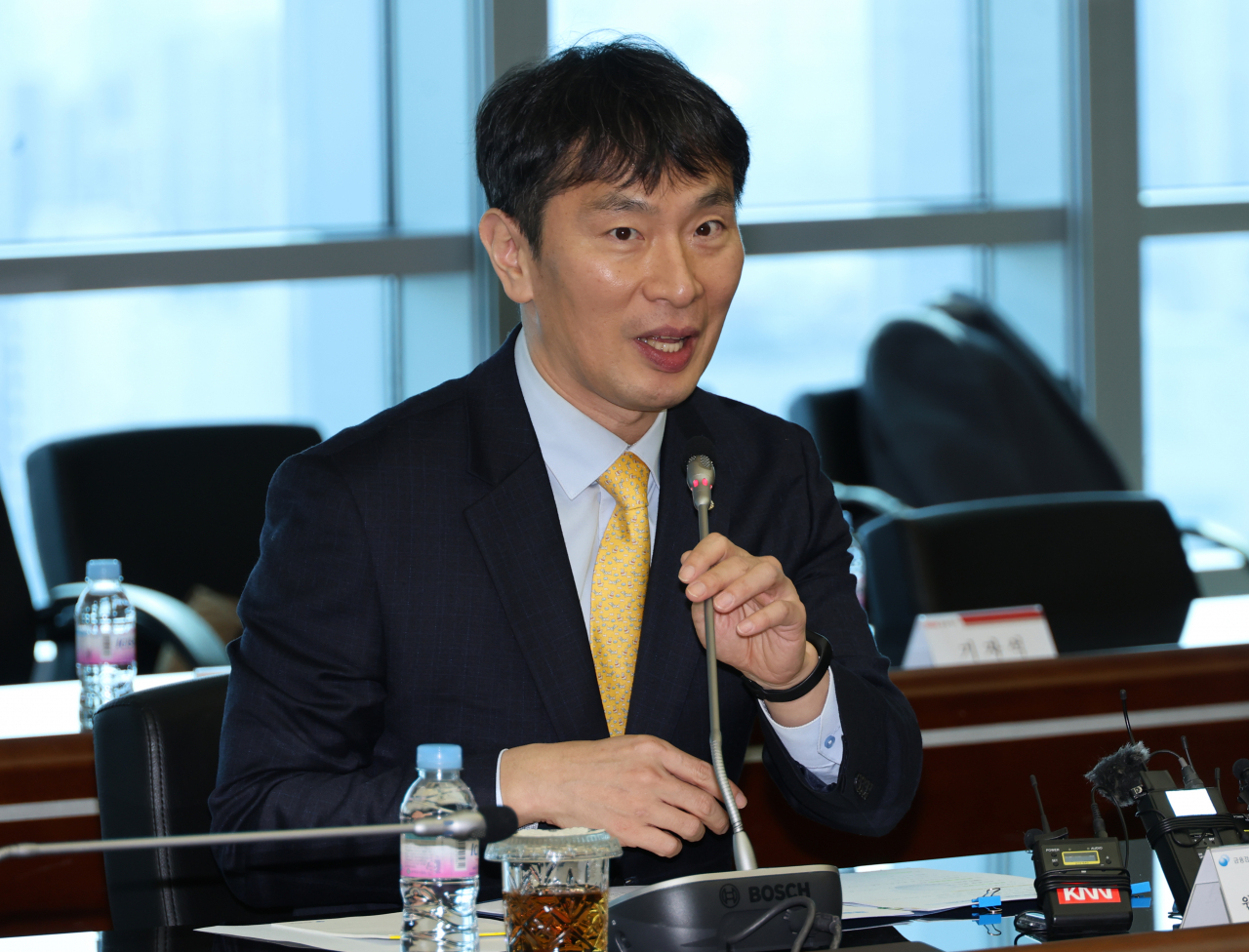 Lee Bok-hyun, chief of the Financial Supervisory Service (FSS), speaks during a meeting in Busan, on March 19, 2024. (Yonhap)