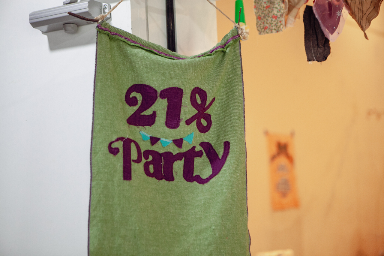 '21% party' embroidered on a piece of fabric at a 21% Party held in Seongsu-dong, Seoul, April 20, 2024 (Wear Again Lab)