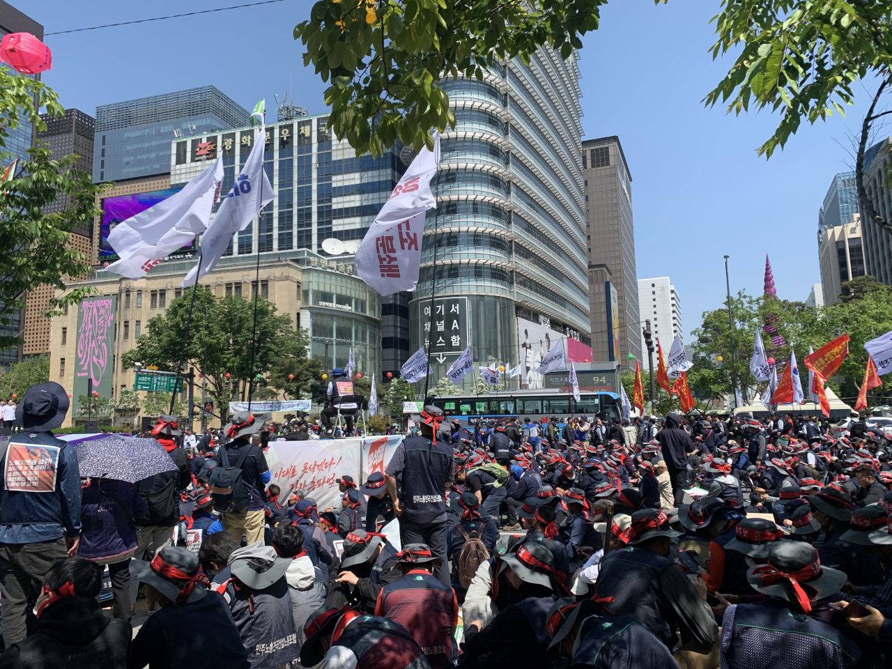 Members of the Korean Confederation of Trade Unions take part in a rally near Gwanghwamun Square in Seoul on May 1, 2023, as part of activities to commemorate Labor Day, also known as International Workers' Day. (No Kyung-min/ The Korea Herald)