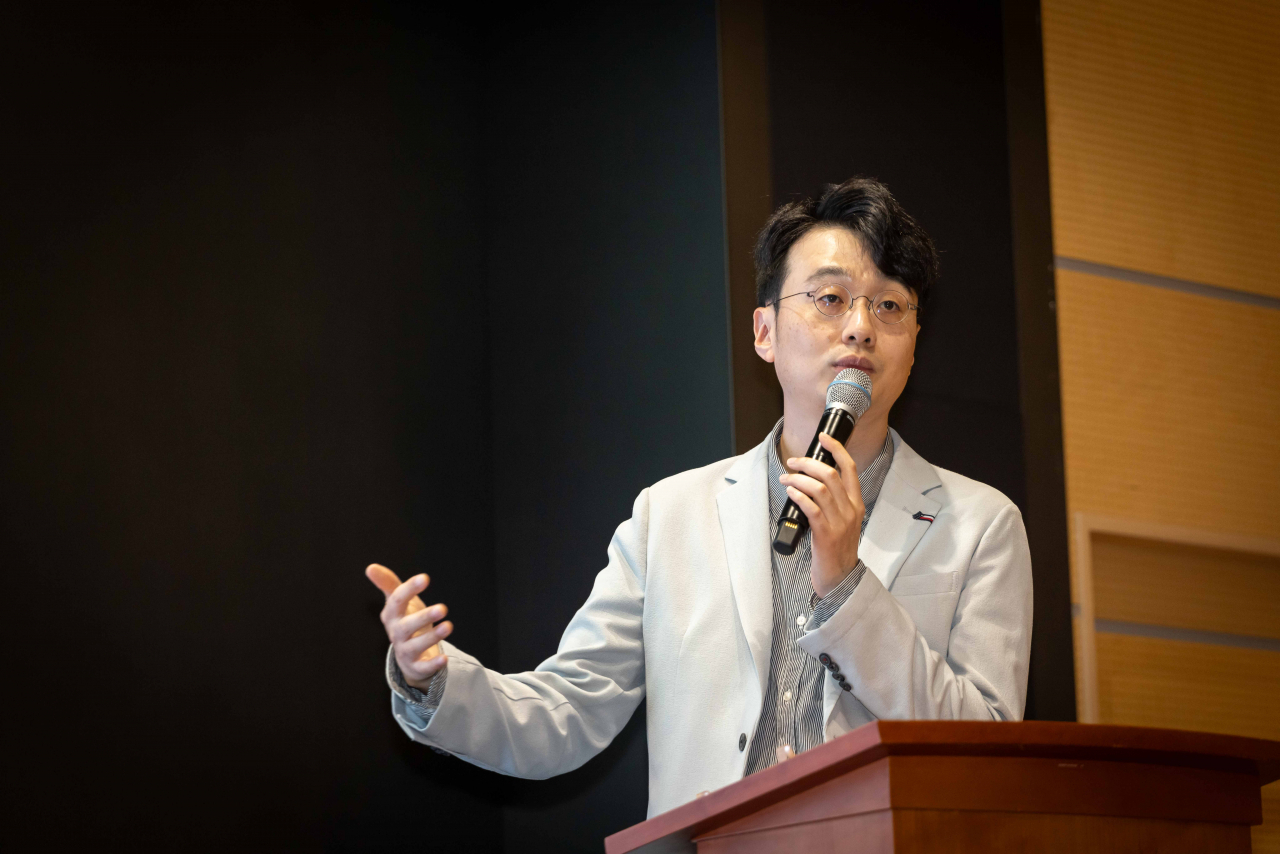 Jeong Min-young, vice president of AI platform at SK Telecom, delivers a presentation during a press conference held at the company's headquarters in Seoul, Tuesday. (SK Telecom)