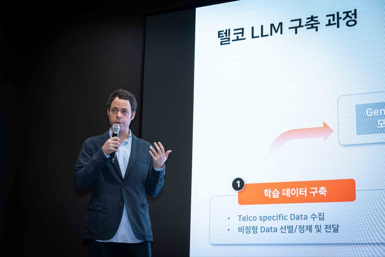 Eric Davis, vice president of AI tech collaboration at SK Telecom, delivers a presentation during a press conference held at the company's headquarters in Seoul, Tuesday. (SK Telecom)