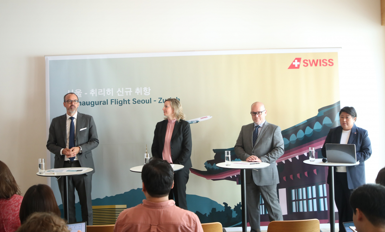 (From left) Chief Financial Officer SWISS Markus Binkert, Vice President Brand Experience SWISS Julia Hillenbrand, General Manager Korea SWISS, Leandro Tonidandel and Korea Switzerland Tourism Market Manager Kim Jean, stand on the stage during the press conference commemorating the launch of SWISS' Incheon-Zurich route, held at the Swiss Embassy in Seoul on Thursday. (Swiss International Air Lines)