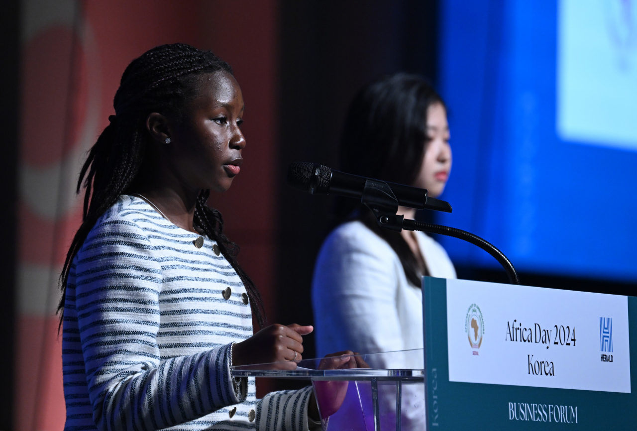 Pearl Mavura, a 15-year-old Tanzanian student (left) and Ra Jian, a 16-year-old South Korean student speak at Africa Day 2024 Korea Business Forum held at the Swiss Grand Hotel in Seoul on Thursday. (Lee Sang-sub/The Korea Herald)