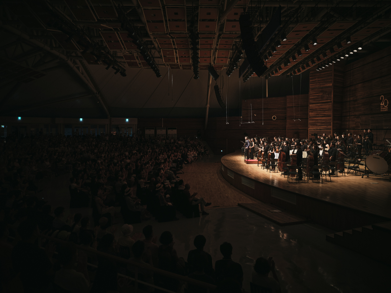 The PyeongChang Festival Orchestra greets the audience after Music in PyeongChang's closing concert in the Music Tent in Pyeongchang, Gangwon Province on Aug. 5, 2023. (Gangwon Art and Culture Foundation)