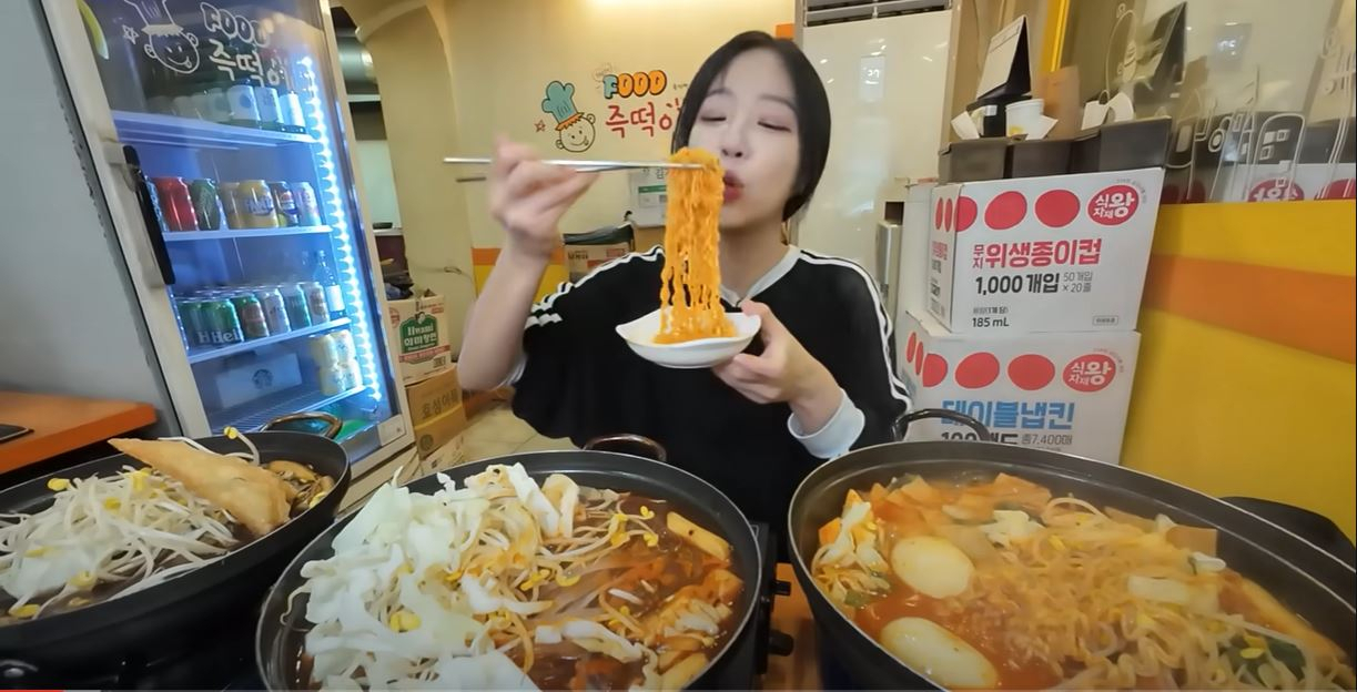 A screen capture of Tzuyang eating food on her YouTube channel (YouTube)