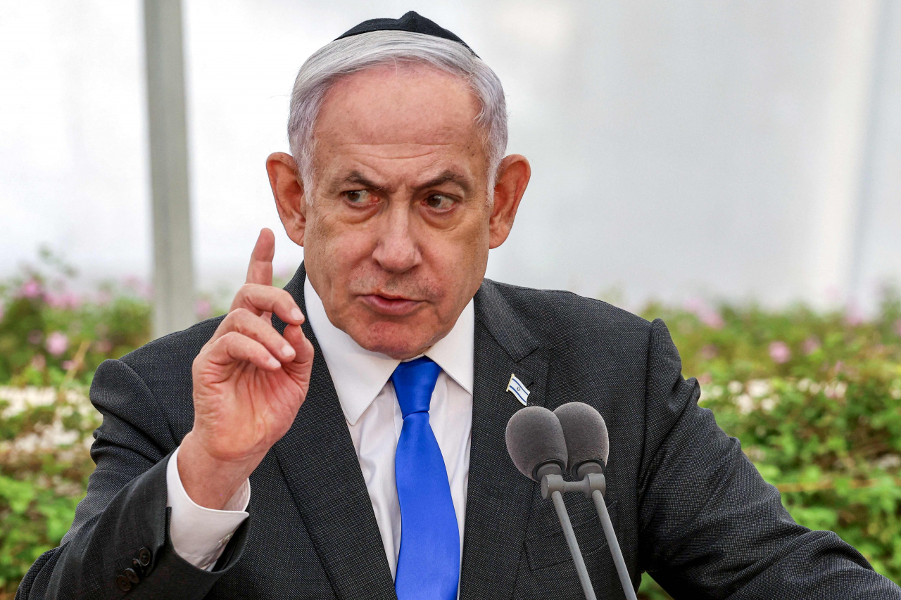 Israeli Prime Minister Benjamin Netanyahu speaks during a state memorial ceremony for the victims of the 1948 Altalena affair, at Nachalat Yitzhak cemetery in Tel Aviv on Tuesday. (AFP-Yonhap)