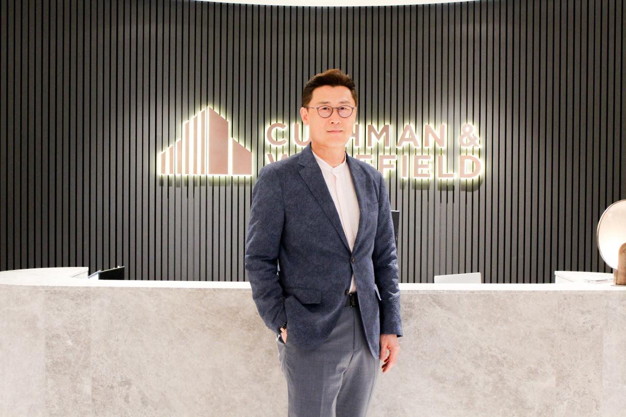 Ryan Lee, executive director of Global Occupier Service at Cushman & Wakefield Korea, poses for photos before an interview with The Korea Herald held at the company’s office in central Seoul, Thursday. (Cushman & Wakefield Korea)