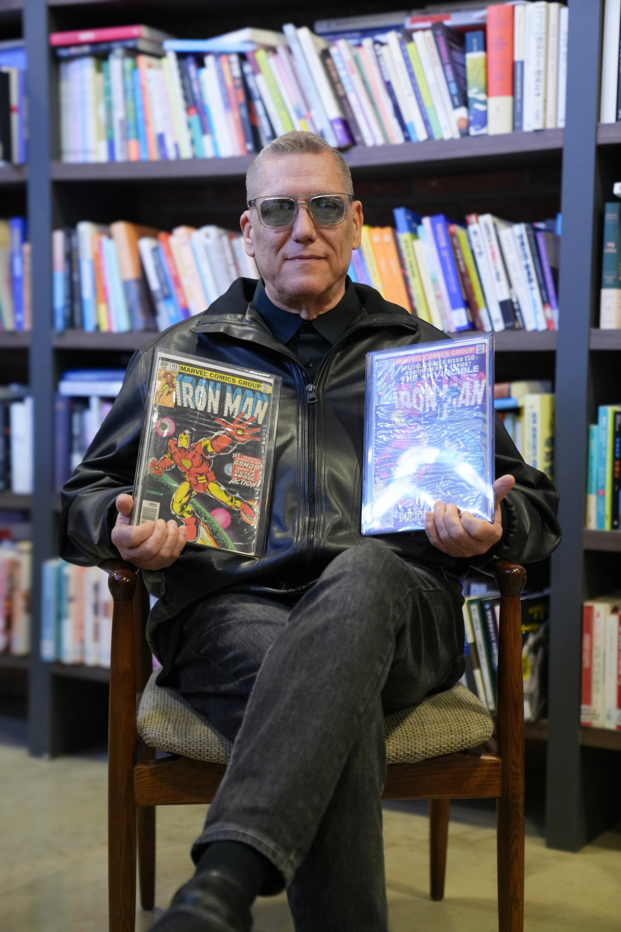 Bob Layton poses with his artwork for 