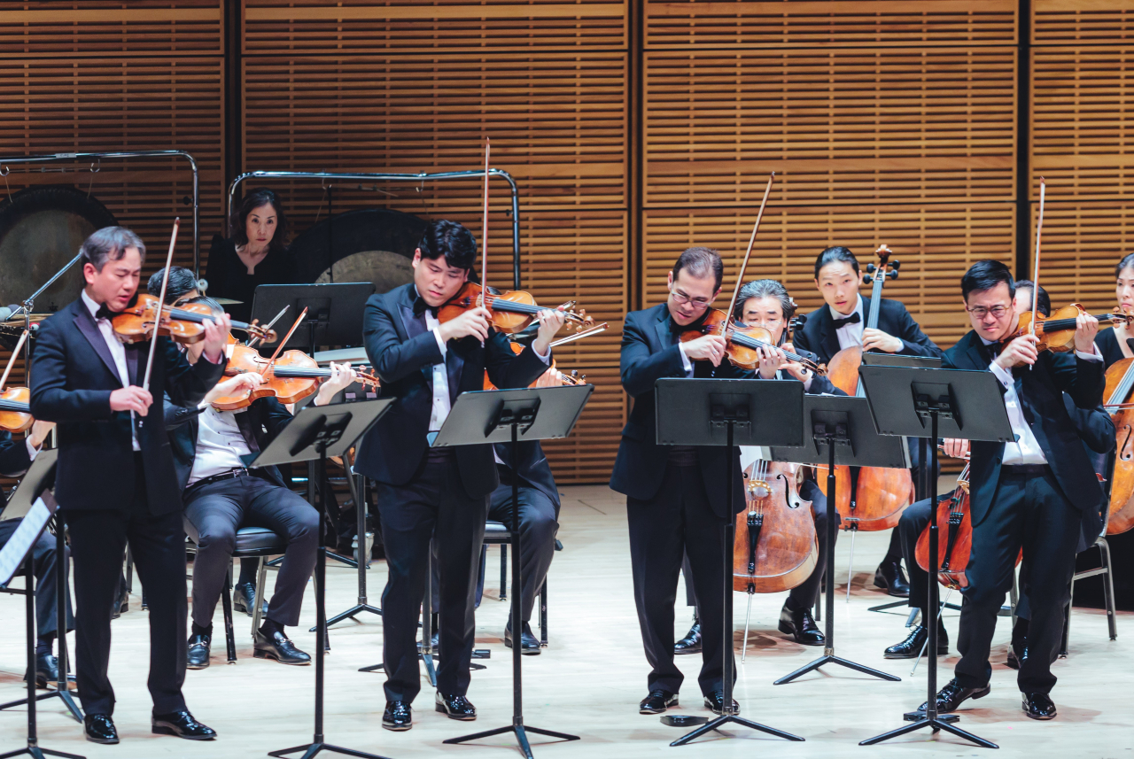 (From left) Violinists Frank Huang, Daniel Cho, David Chan and Andrew Wan perform the world premiere of Kim Texu's 