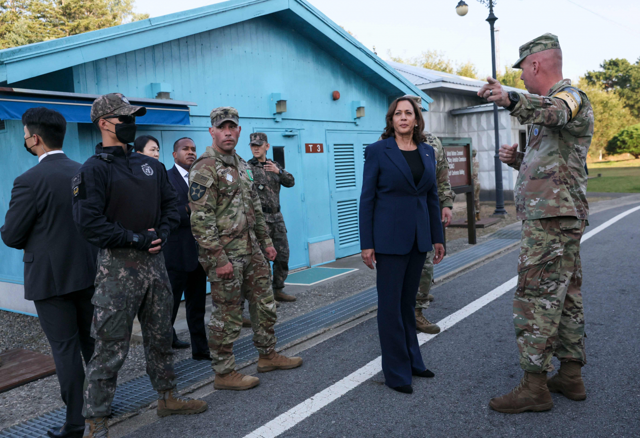 US Vice President Kamala Harris is given a tour near the demarcation line at the demilitarized zone (DMZ) separating North and South Korea, in Panmunjom on September 29, 2022. (Pool via AFP)