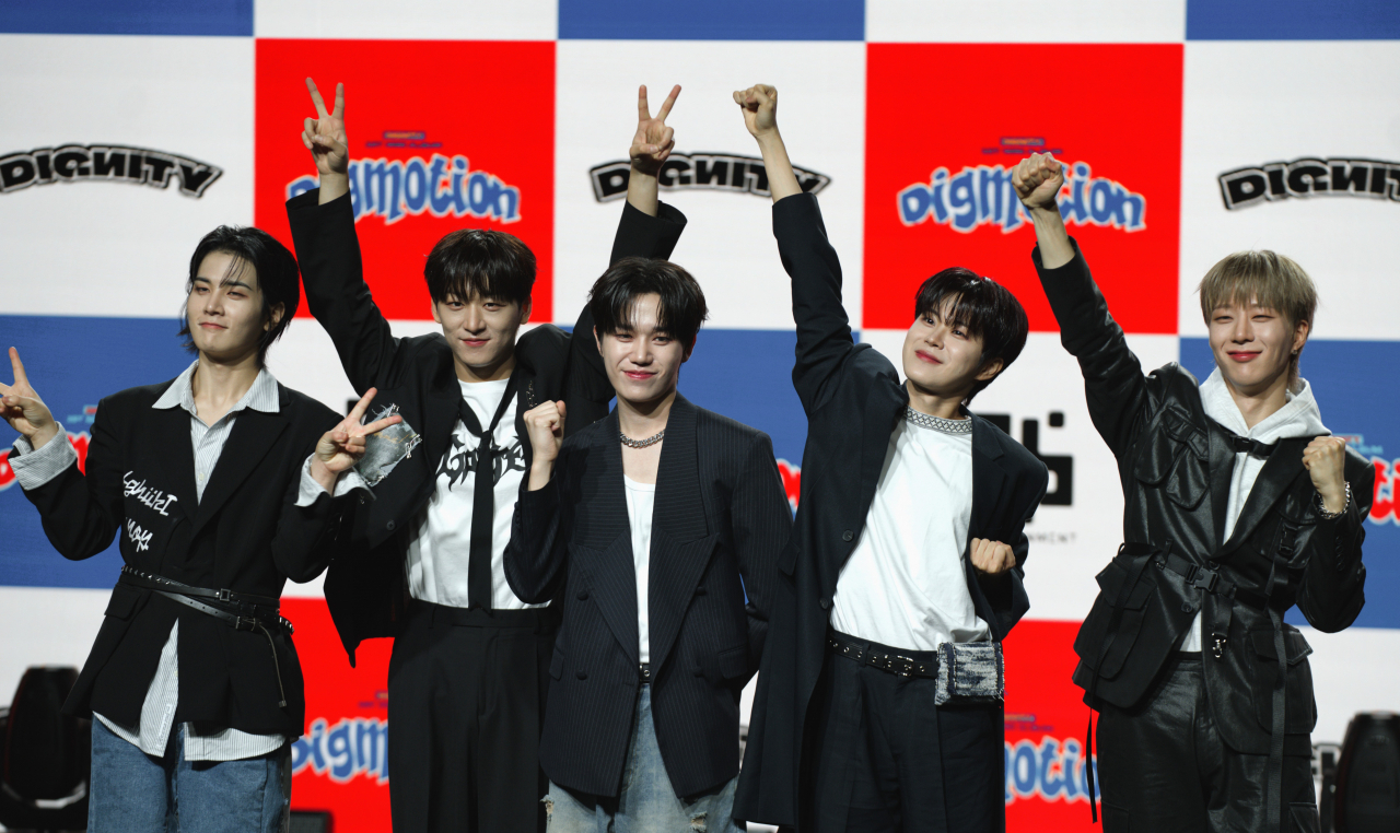 From left: Dignity's Hyungjin, ON, Luo, Minseok and Luke pose for a photo at a press conference in Gangnam, Seoul, Wednesday. (Kwon Min-seo/The Korea Herald)