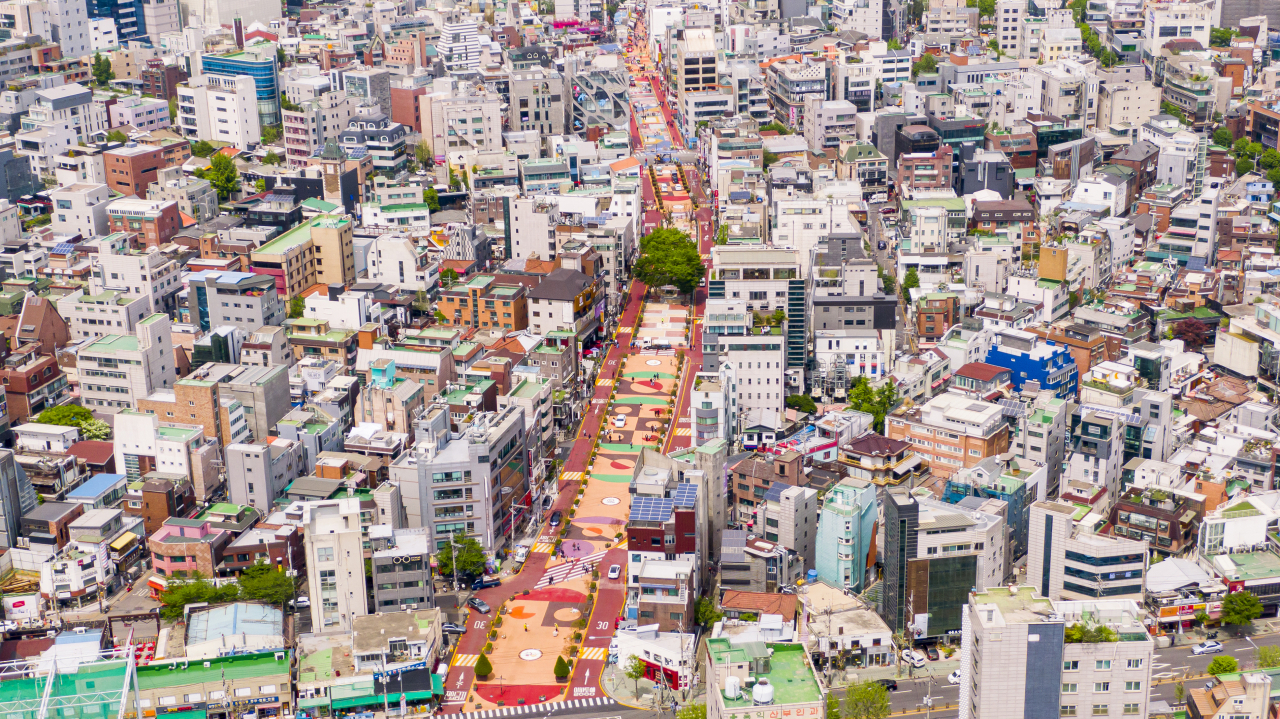 Aerial view of Hongdae's Red Road captured by a drone, showcasing the vibrant energy of the city. (Mapo-gu Office)