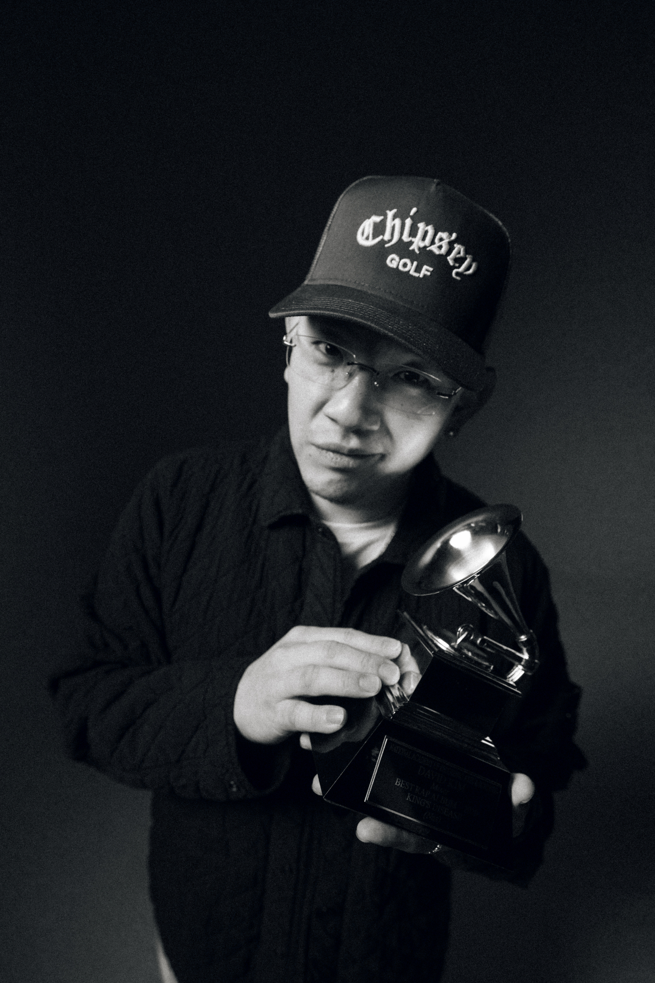 Yungin poses with his Grammy Award. (Hugh Hong/The Korea Herald)