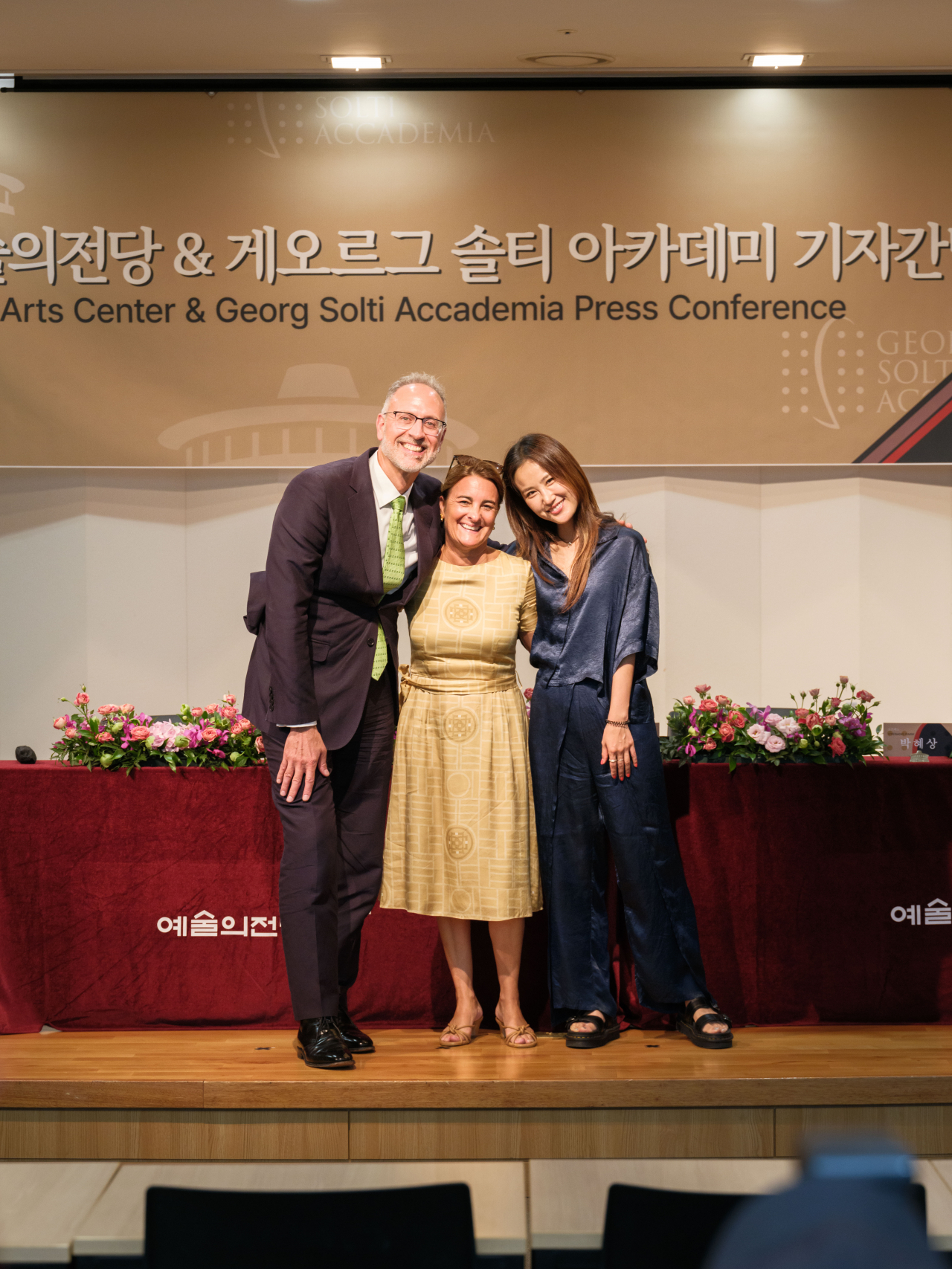 (From left) The Georg Solti Accademia Artistic Director Jonathan Papp, Executive Director and Founder Candice Wood and soprano Park Hae-sang pose for photos after a press conference at the Seoul Arts Center, Tuesday. (Seoul Arts Center)