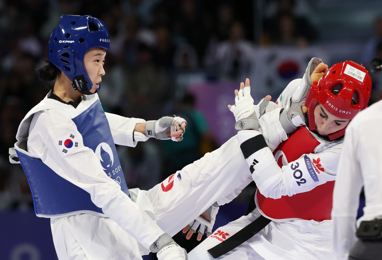 Underdog Kim Yujin beats odds to climb to top of taekwondo world in Paris