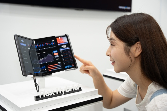 Samsung Display's Flex Hybrid OLED panel, which combines foldable and slidable functions, is displayed at the K-Display 2024 exhibition in Seoul, Wednesday. (Samsung Electronics)