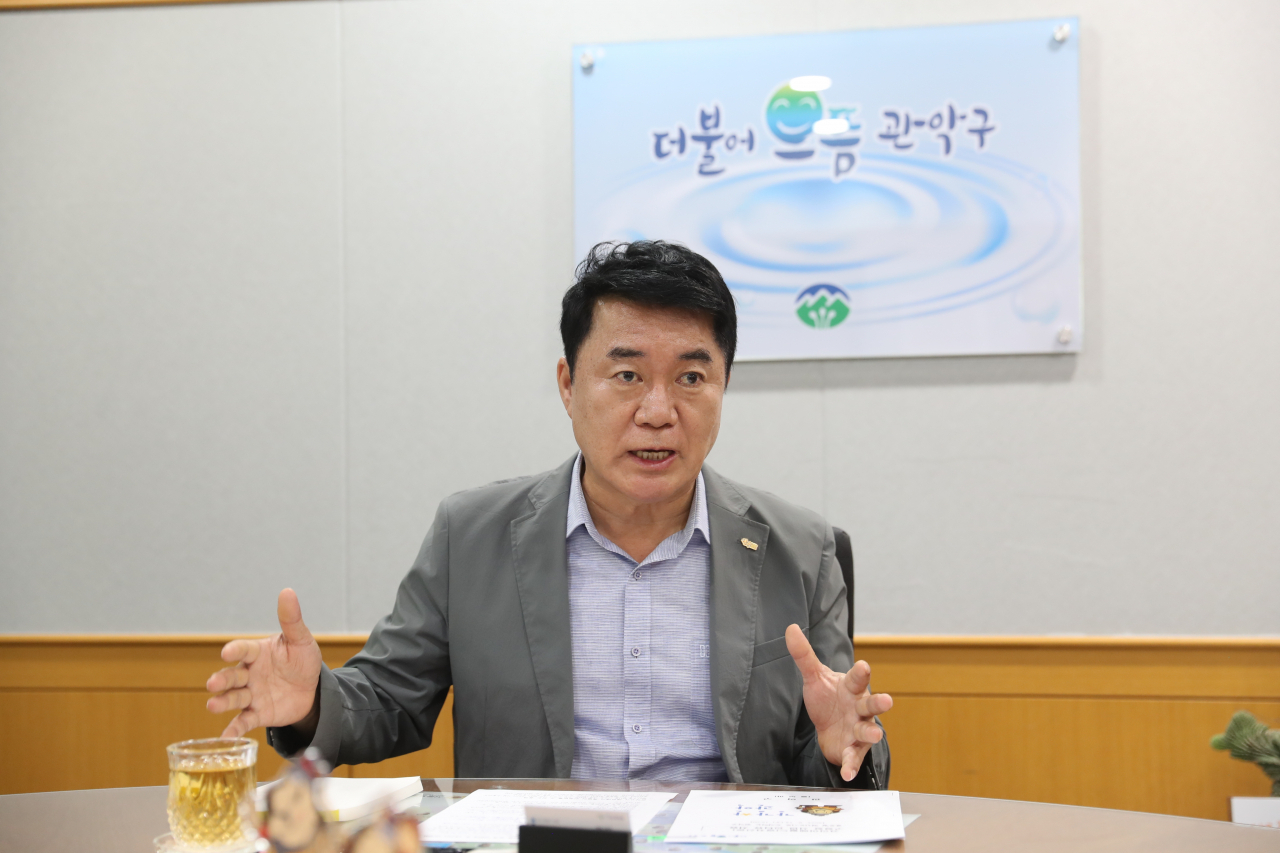 Park Jun-hee, district head of Gwanak-gu, Seoul, introduces his plan to transform Gwanak into a vibrant hub for innovation and youth culture during an interview with The Korea Herald at his office, Aug. 14. (Gwanak-gu Office)