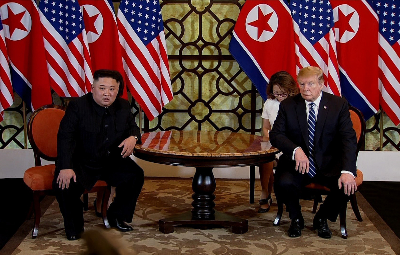 This file photo shows North Korean leader Kim Jong-un (left) and US President Donald Trump at the Sofitel Legend Metropole Hanoi hotel on Feb. 28, 2019. (Yonhap)