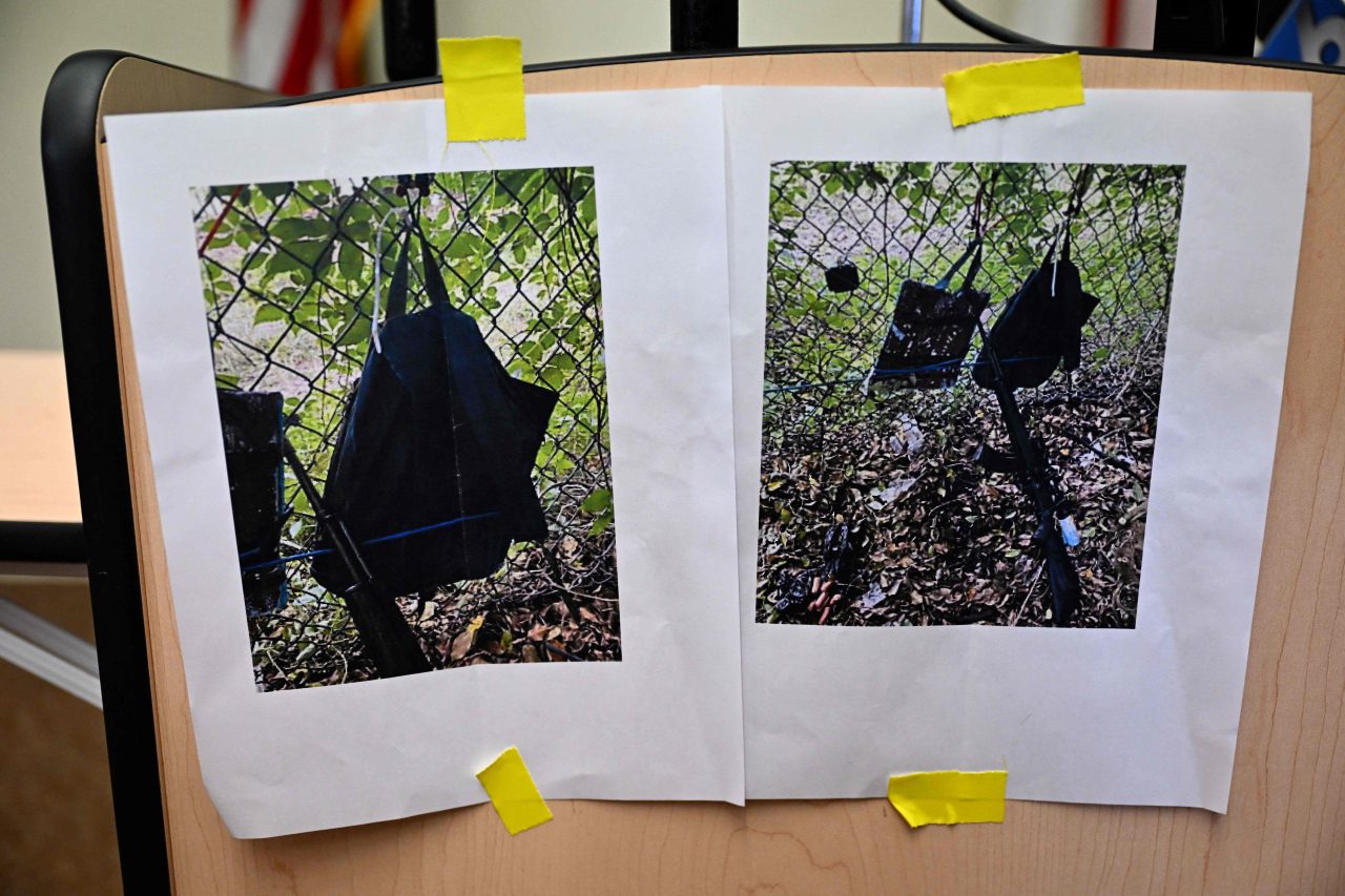 Pictures of evidence found at the fence of former US president Donald Trump's golf course are shown at a press conference in West Palm Beach, Florida, on Sunday, following a shooting incident at former US president Donald Trump's golf course. Trump's campaign reported Sunday that there had been 