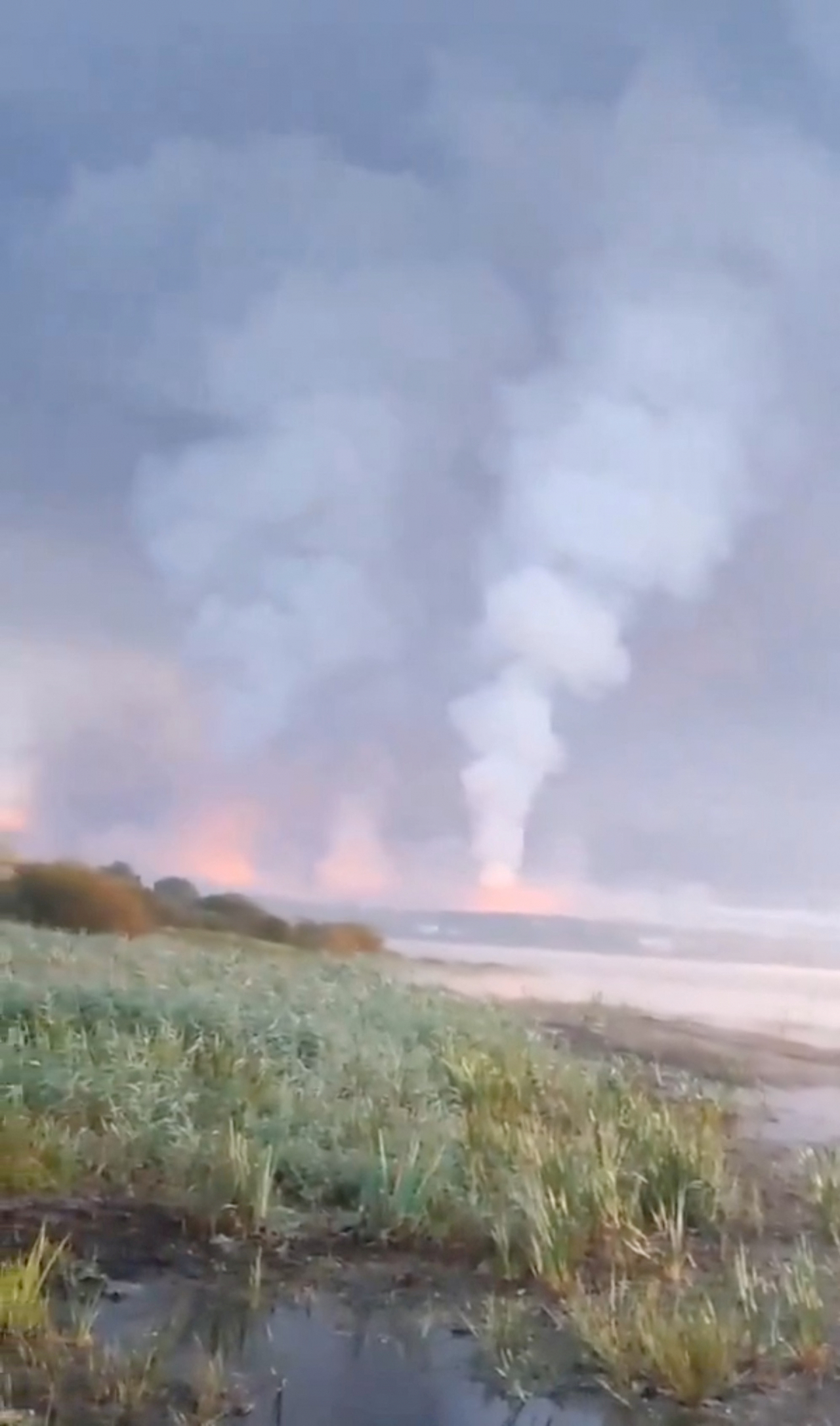 Smoke and flames rise following a Ukrainian drone attack, amid the Russia-Ukraine conflict, in Toropets, Tver region, Russia on Wednesday in this screen grab obtained from a social media video. (Reuters)