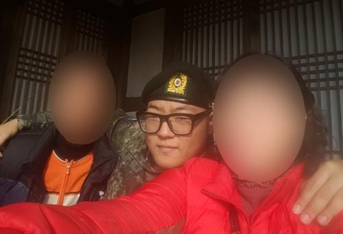 Jeon Yeong-jin (center) is shown in a photograph provided by his family. (Family of Jeon Yeong-jin)