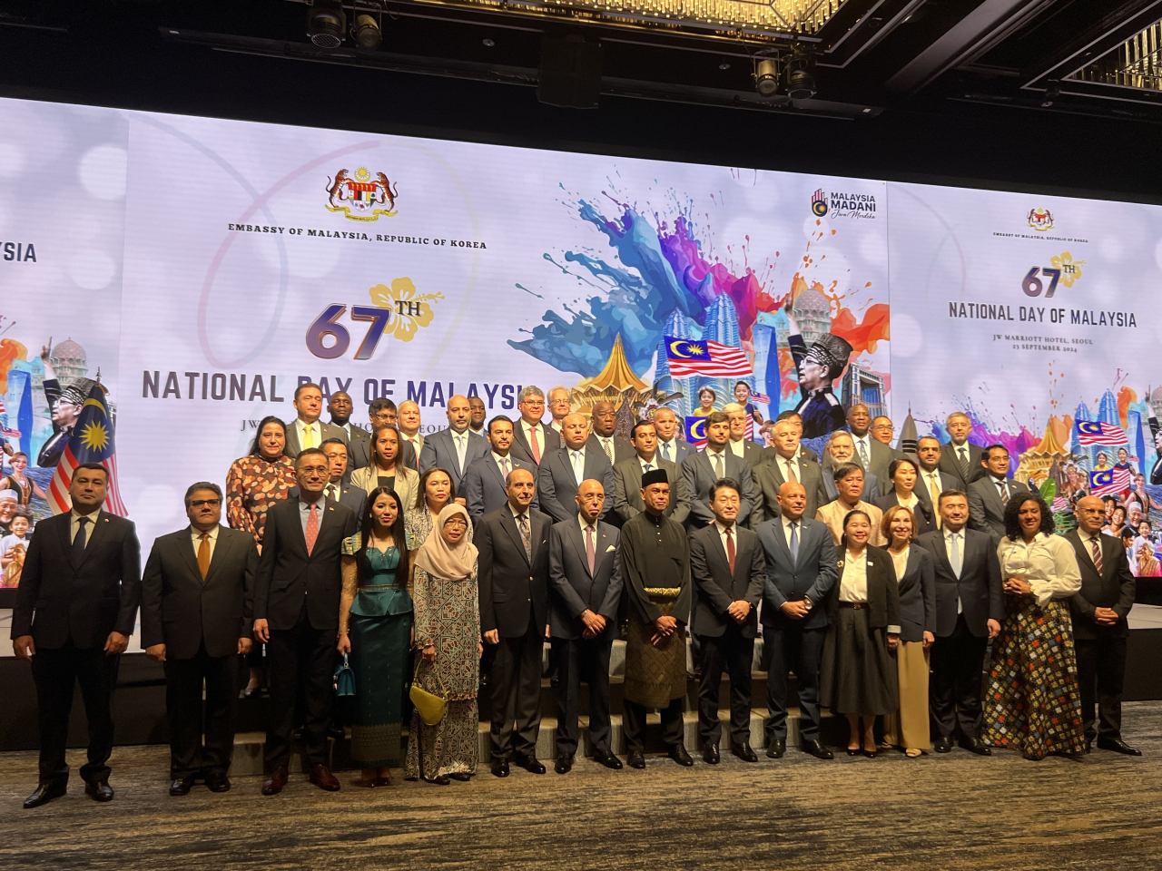 Attendees of the 67th National Day of Malaysia event held at JW Marriott Hotel in Seocho-gu, southern Seoul, Monday, pose for a picture. (Park Jun-hee/The Korea Herald)