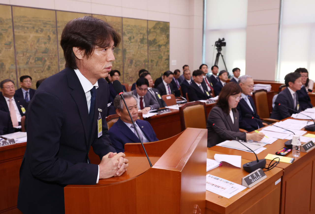 Hong Myung-bo, head coach of the South Korean men's national football team, answers a question before the parliamentary committee on culture, sports and tourism at the National Assembly in Seoul, Tuesday. (Yonhap)