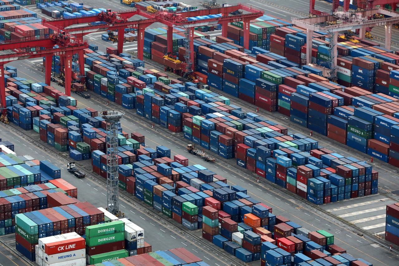 Shipping containers are stacked at a port in the southeastern city of Busan. (Getty Images)