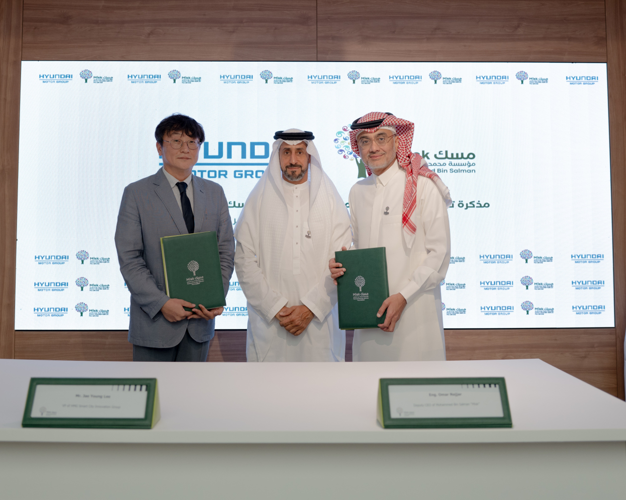 From left: Lee Jae-yong, head of smart city development at Hyundai Motor Group’s Global Strategy Office, stands with Badr Hamoud Albadr, CEO of the Misk Foundation, and Deputy CEO Omar Najjar after signing a memorandum of understanding in Riyadh, Saudi Arabia, Monday. (Hyundai Motor Group)