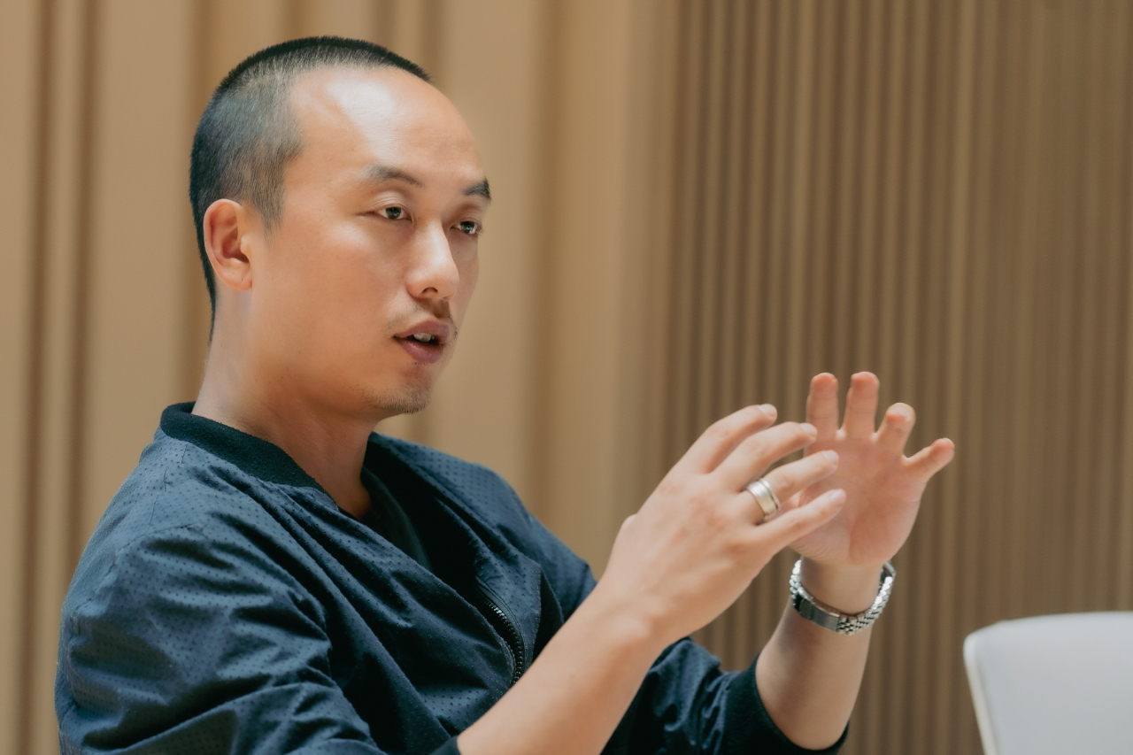 Director Lee Kyung-sung speaks during a rehearsal for 