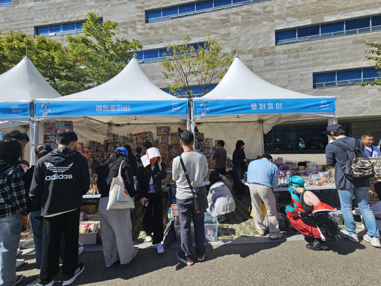 Visitors shop for cartoon-related goods at the 2024 BICOF held in Bucheon, Gyeonggi Province. (Lee Yoon-seo/The Korea Herald)