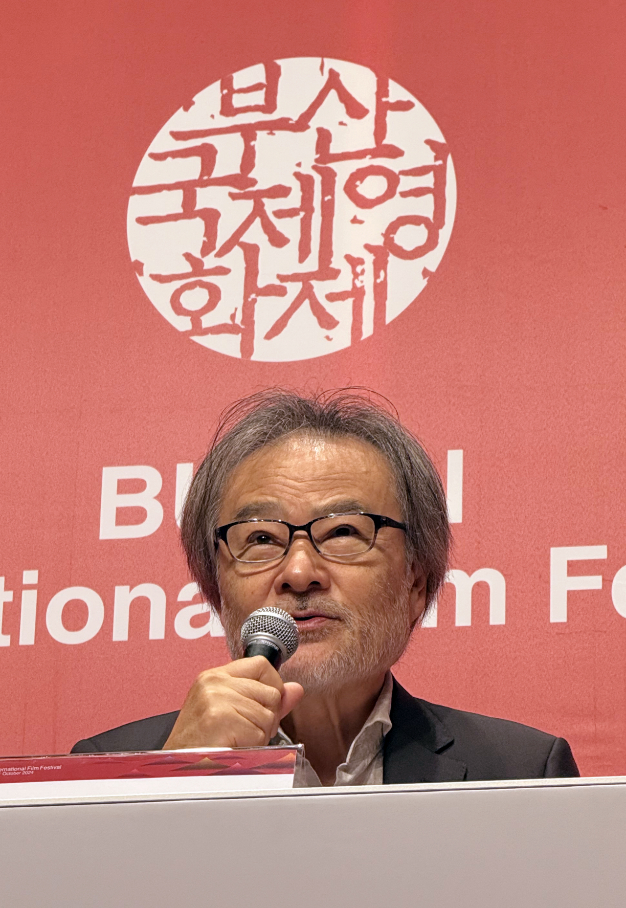 Acclaimed Japanese filmmaker Kiyoshi Kurosawa speaks during a press conference in the southeastern city of Busan on Thursday. (Yonhap)