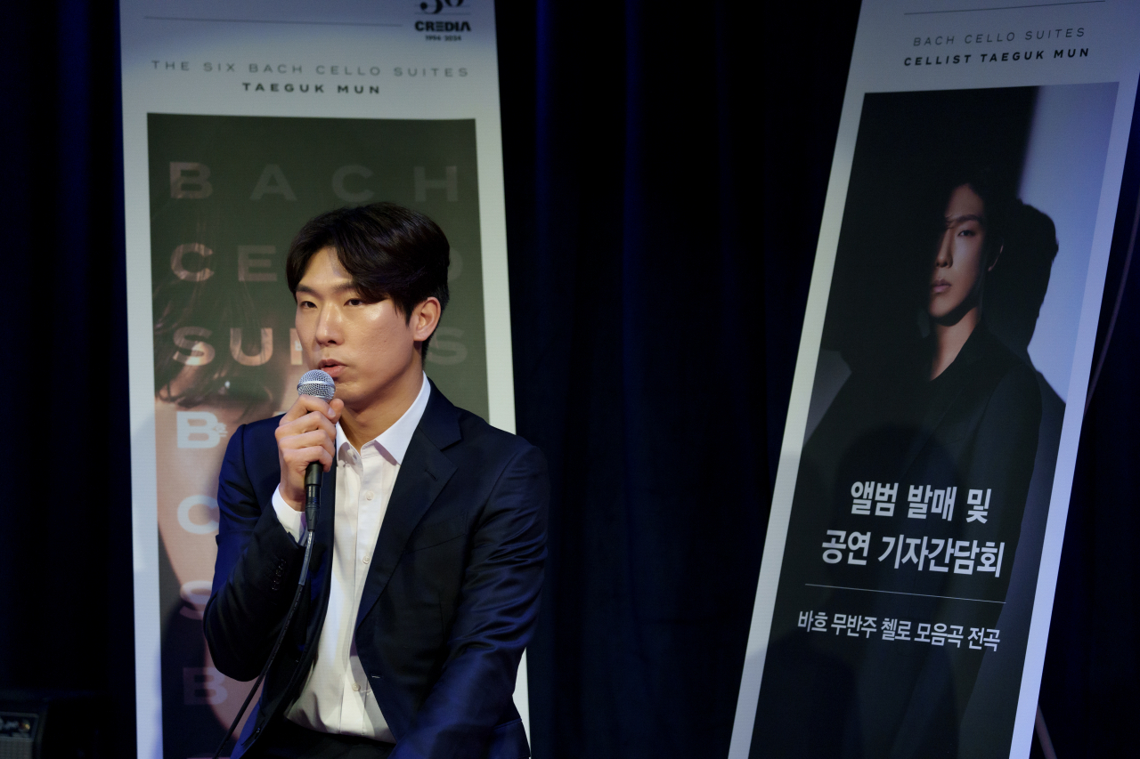 Cellist Mun Tae-guk speaks during a press conference held in Seoul on Monday. (Credia)