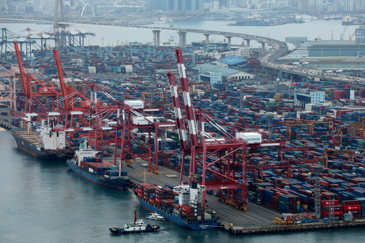 Shipping containers are stacked at a port in the southeastern city of Busan. (Getty Images)