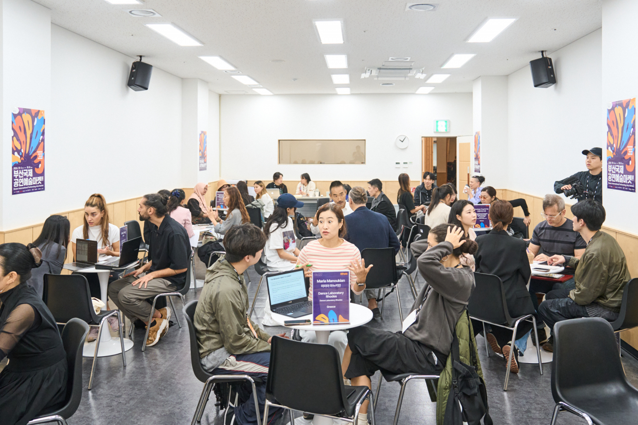 Delegates and performing arts groups attend business meetings at BPAM on Saturday. (Busan Cultural Foundation)