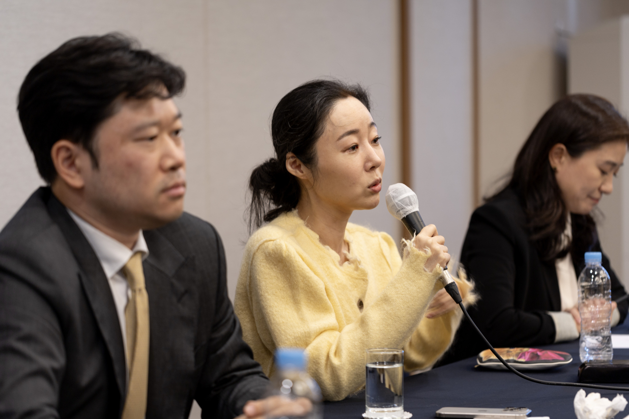 Min Hee-jin (center), the former CEO of Ador, speaks at a press conference regarding the company's extraordinary general meeting in Jung-gu, Seoul, May 31. (Im Se-jun/The Korea Herald)