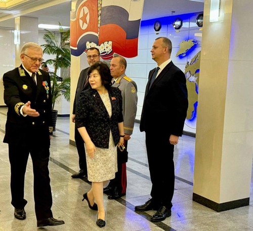 This file photo, captured from the Telegram account of the Russian Embassy in North Korea on Saturday shows Foreign Minister Choe Son-hui (center) attending a reception hosted by Russian Ambassador Alexandr Matsegora. (Yonhap)