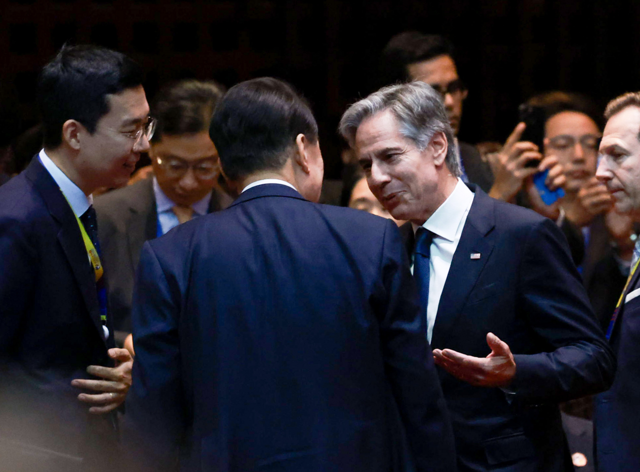 President Yoon Suk Yeol (second from left, front) and US Secretary of State Antony Blinken (third from left, front) are seen during the East Asia Summit held in Vientiane, Laos on Friday. (Pool photo via Yonhap)