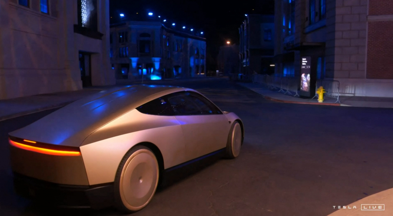 Captured image from a video released by Tesla on Thursday shows the automaker’s robotaxi during a launch event at the Warner Brothers studio lot in Los Angeles, US. (Reuters-Yonhap)