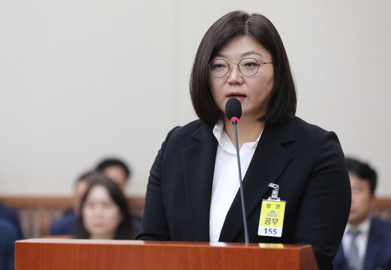 Ador CEO Kim Ju-young answers to a lawmaker's question during a National Assembly audit in Seoul, Tuesday. (Newsis)