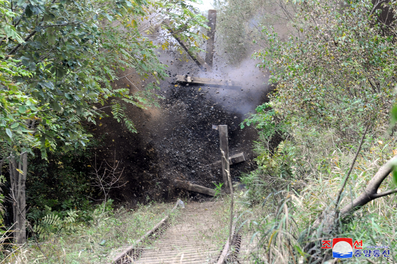 Closed-circuit TV footage of North Korean military exploding parts of inter-Korean roads on Tuesday. (South Korean Joint Chiefs of Staff)