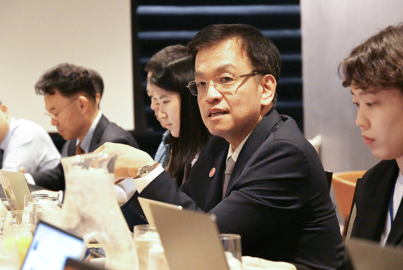 Finance Minister Choi Sang-mok speaks at a press event held in Washington, Friday. (The Ministry of Finance and Economy)