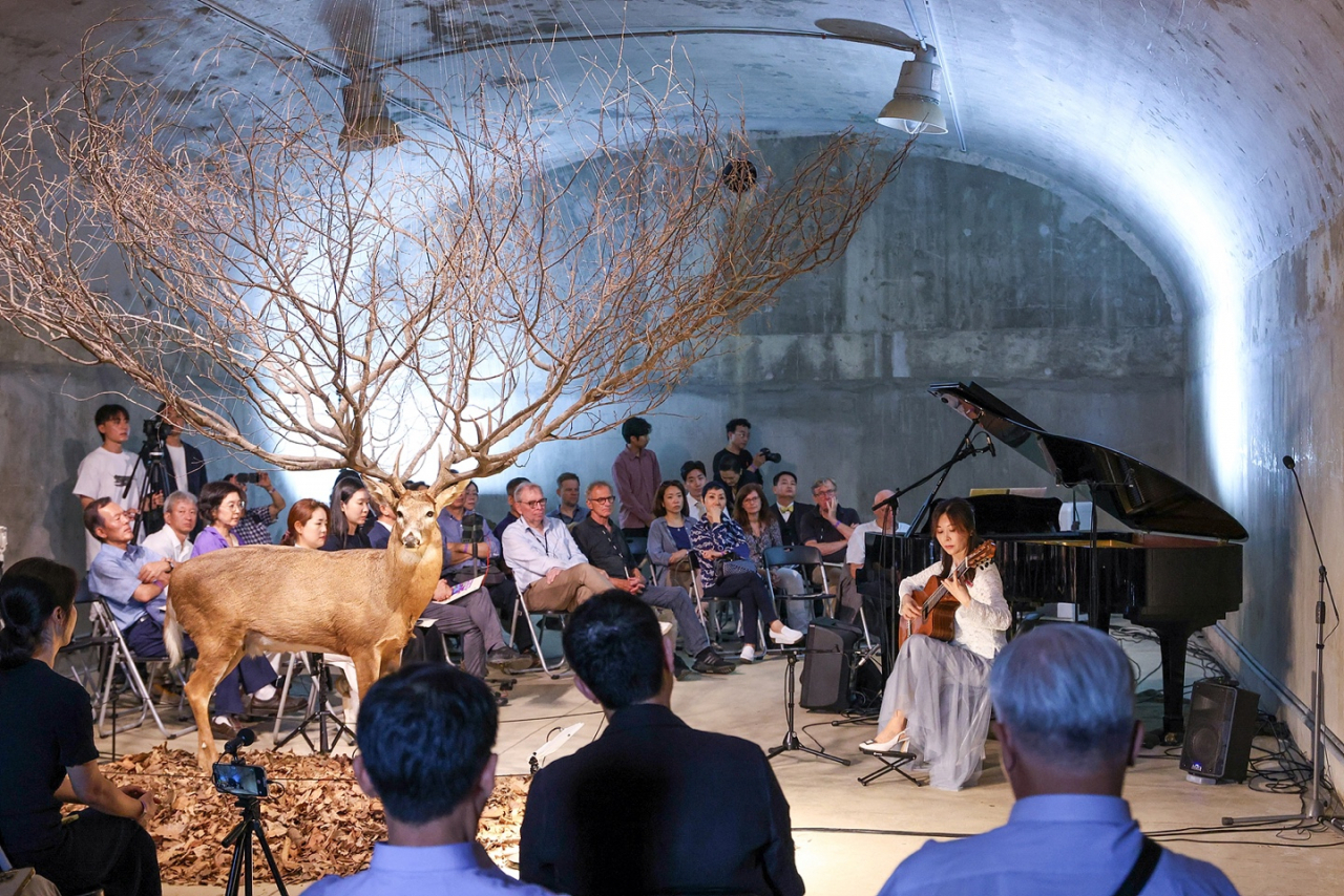 A concert takes place inside the former ammunition depot at Camp Greaves in Paju, Gyeonggi Province on Sept. 19, 2023