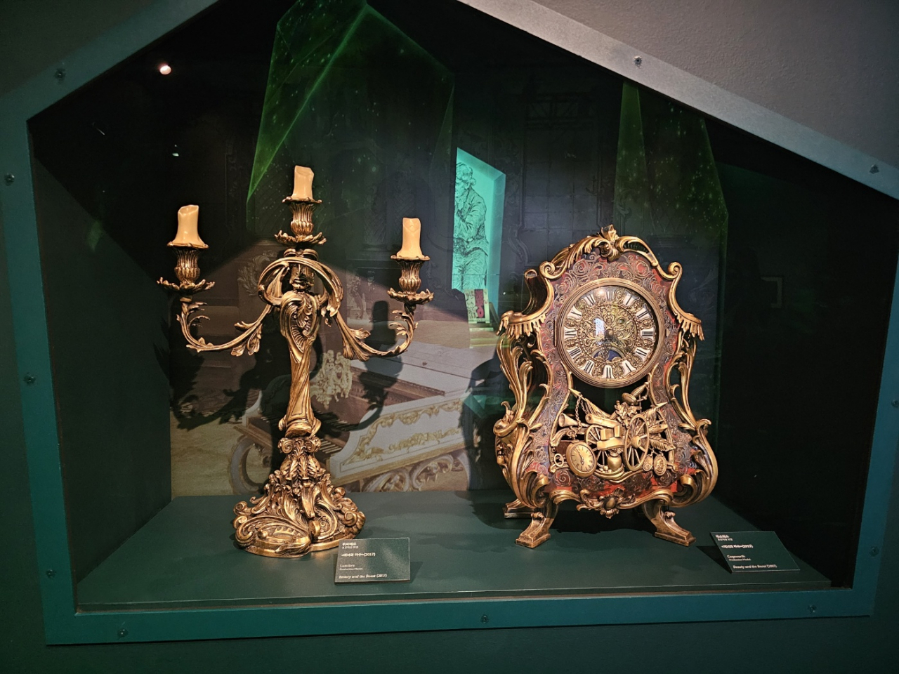 Production models of Lumiere (left) and Cogsworth from 