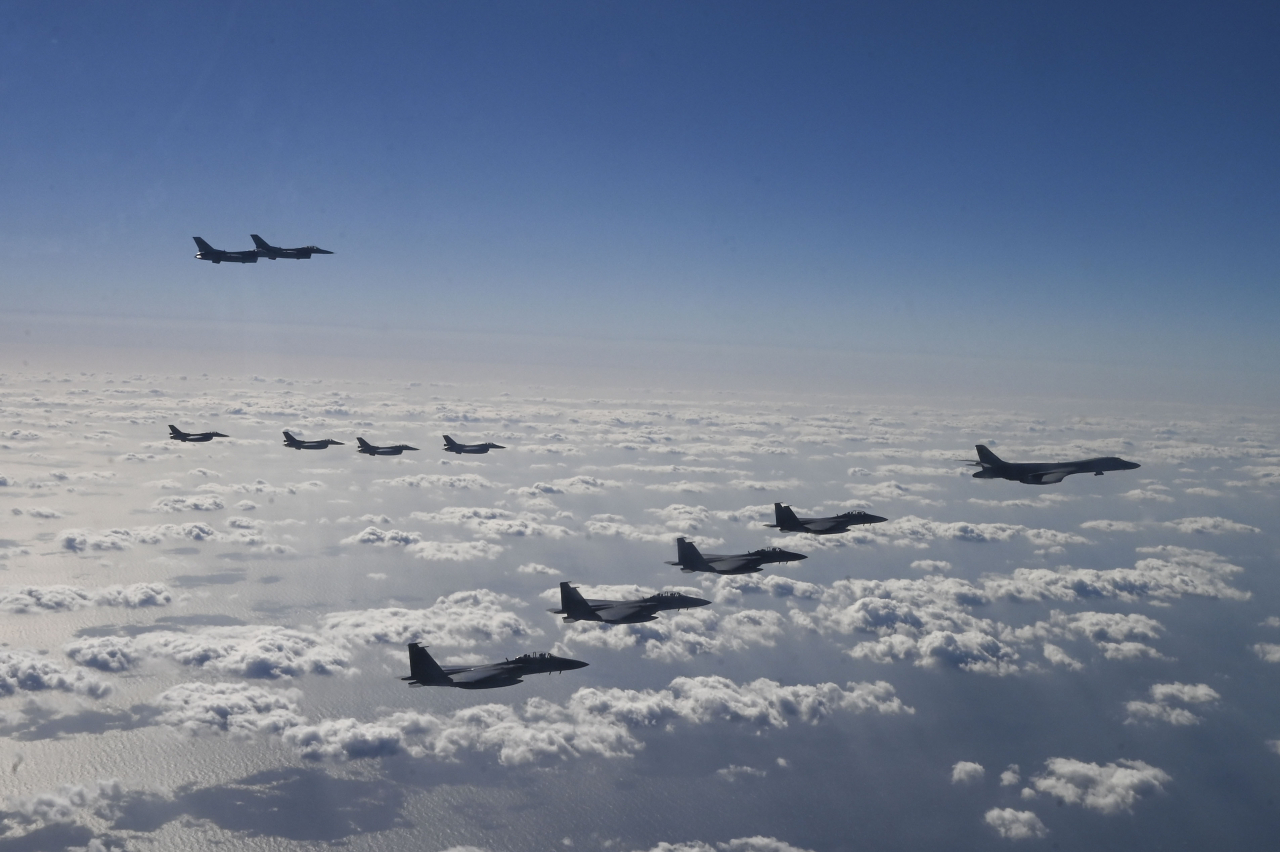 South Korean, US and Japanese fighter jets stage a joint aerial drill over the air defense identification zone between South Korea and Japan on Sunday in response to North Korea’s intercontinental ballistic missile test launch on Oct. 31. (Yonhap)