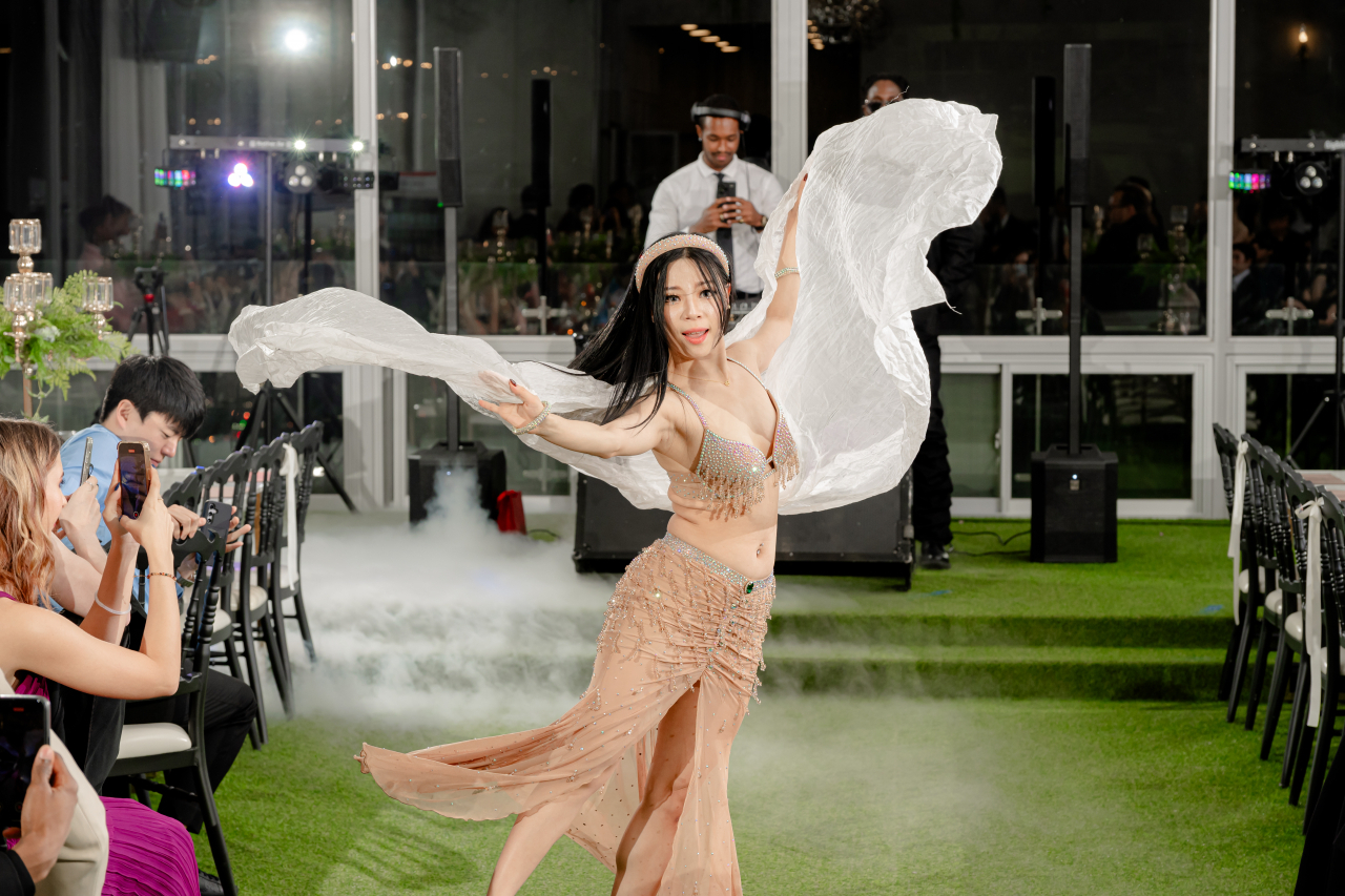 A belly dancer performs during Rebecca Nour and David Yang's wedding. (Rebecca Nour)