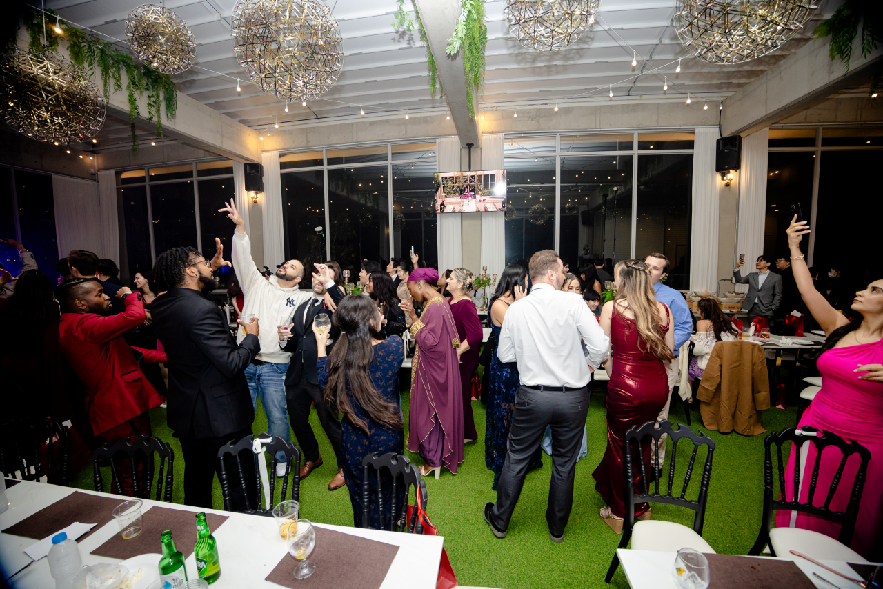 Guests dance to the music played by a DJ at Rebecca Nour and David Yang's wedding. (Rebecca Nour)