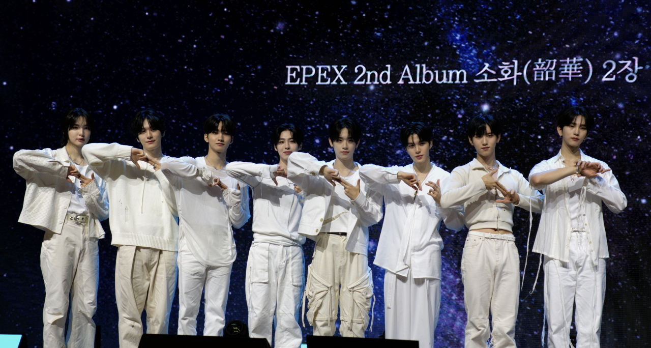 From left: MU, Wish, Jeff, Ayden, Keum Dong-hyun, A-Min, Yewang and Baekseung of Epex pose for a photo at a press conference in Yongsan, Seoul, Tuesday. (Kwon Min-seo/The Korea Herald)