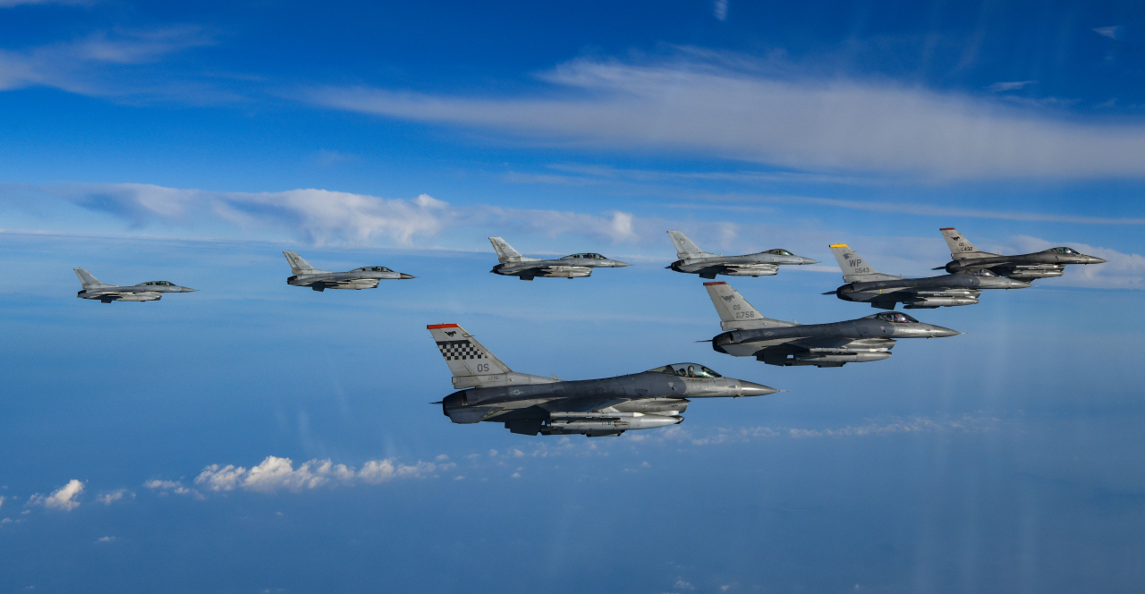 South Korea's Joint Chiefs of Staff announced on October 31 that a large-scale joint air drill with the US was conducted in response to North Korea's intercontinental ballistic missile launch. South Korean KF-16 and US F-16 fighter jets are shown in a joint attack formation exercise in this photo provided by the JCS on the same day. (Yonhap)